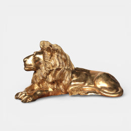 Bronze statue of a recumbent lion