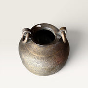 Vase en bronze sculpé