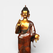 Bronze standing Buddha statue