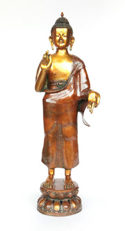Bronze standing Buddha statue