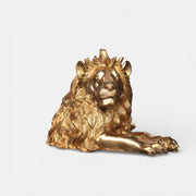 Bronze statue of a recumbent lion