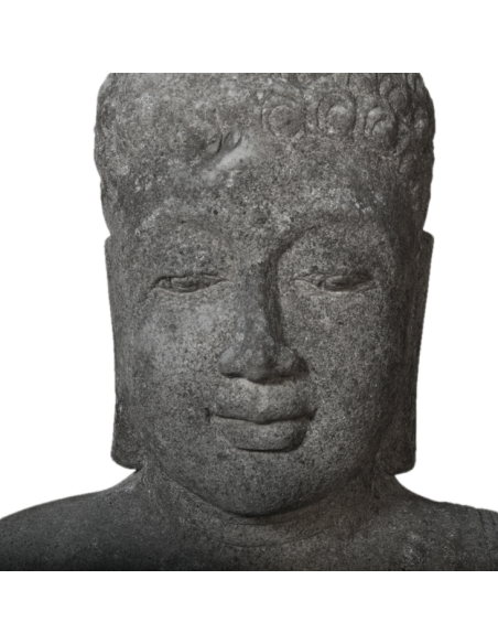 Buddha en méditation ancien en pierre volcanique