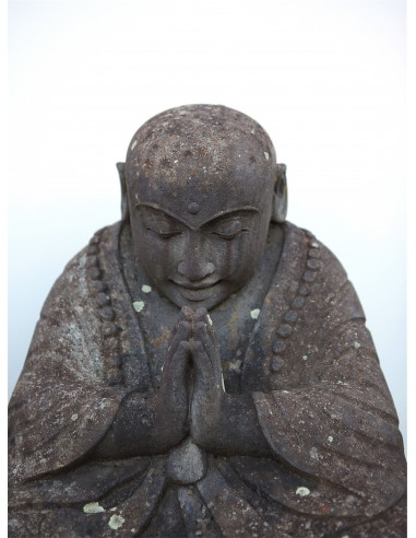"Palu" Statue of happy seated monk...