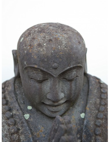 "Palu" Statue of happy seated monk...