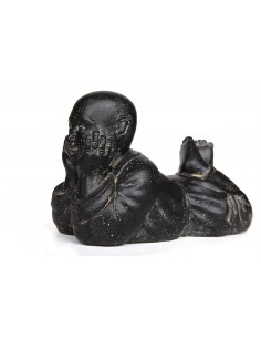 Statue of a laying monk