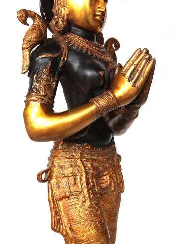 Woman standing in bronze "Atmanjali...