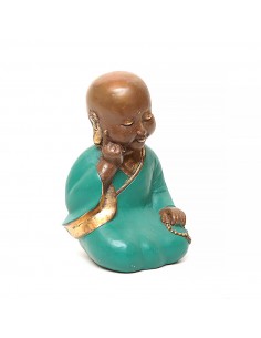 Monk sitting in painted...